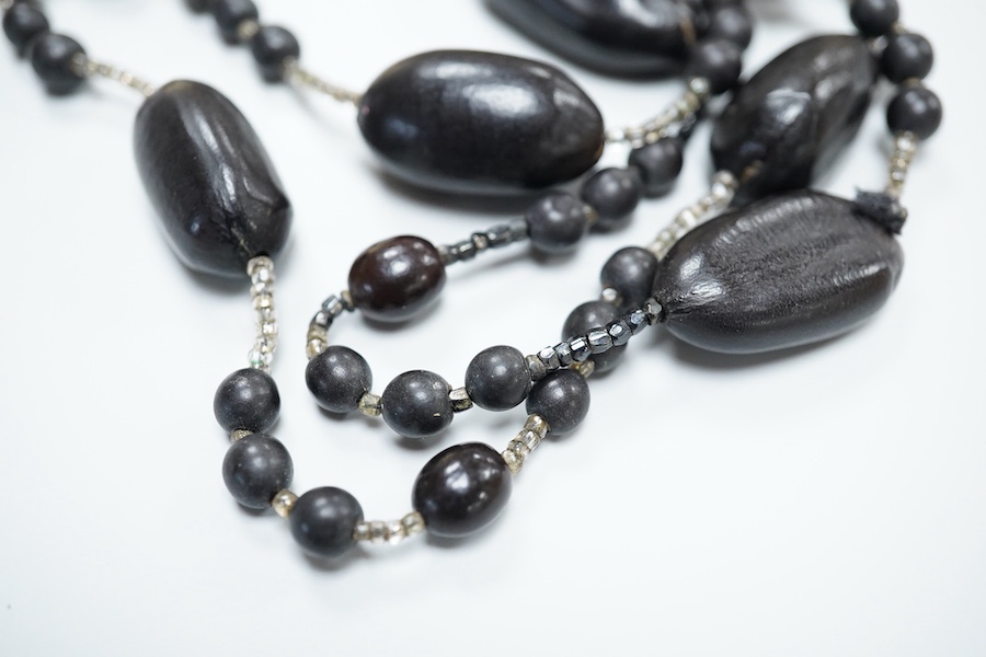 Two coral necklaces and a group of costume jewels, comprising: two coral bead necklaces, each with a gold clasp, combined gross weight approximately 35 grams; together with a simulant pearl necklace and pair of earrings